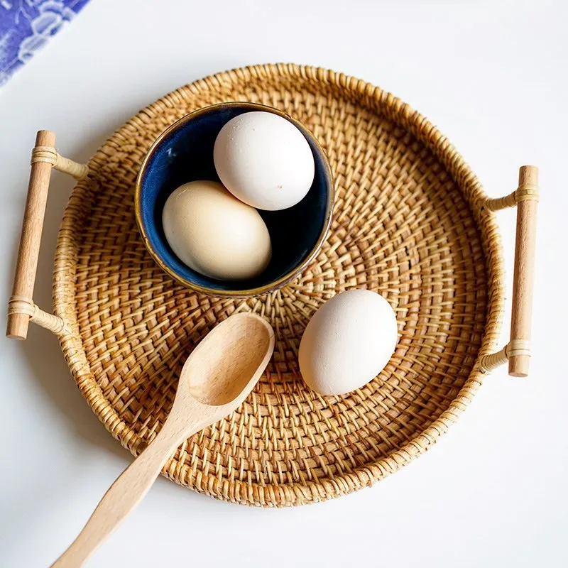 Wholesale rattan woven basket tray round food serving trays with wood handles home decor