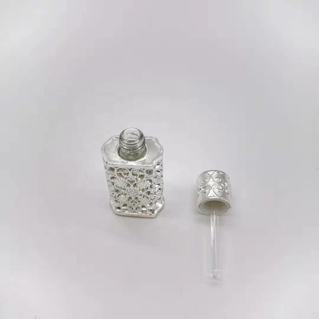 Hot Sale 3-50ml Unique Arabic Style Metal Essential Oil Attar Perfume Glass Bottles With Glass Stick