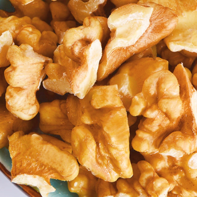 Wholesale High Quality Gansu Hualong peeled Natural Amber pieces Walnuts kernel price Food For Sale in Bulk organic walnuts