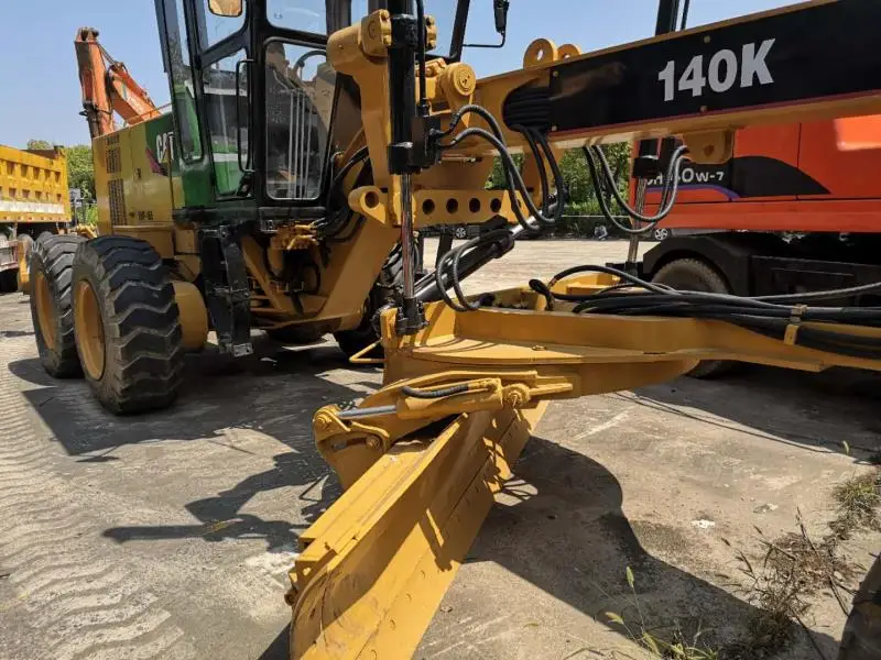 Подержанный автогрейдер cat 140k по хорошей цене