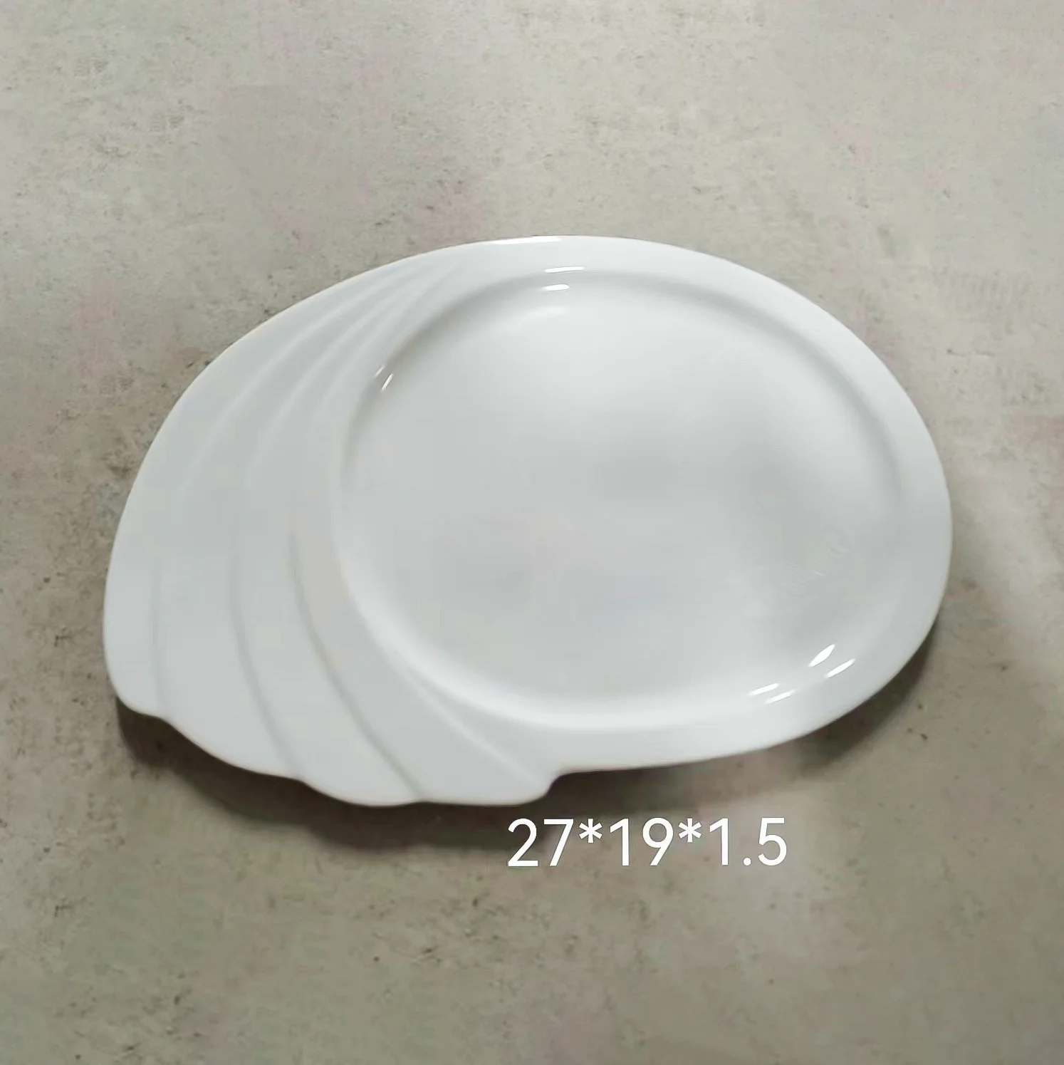Wholesale China White ceramic 13 inch Irregular plate sold and exported by pieces Stock porcelain plate of manufacturer