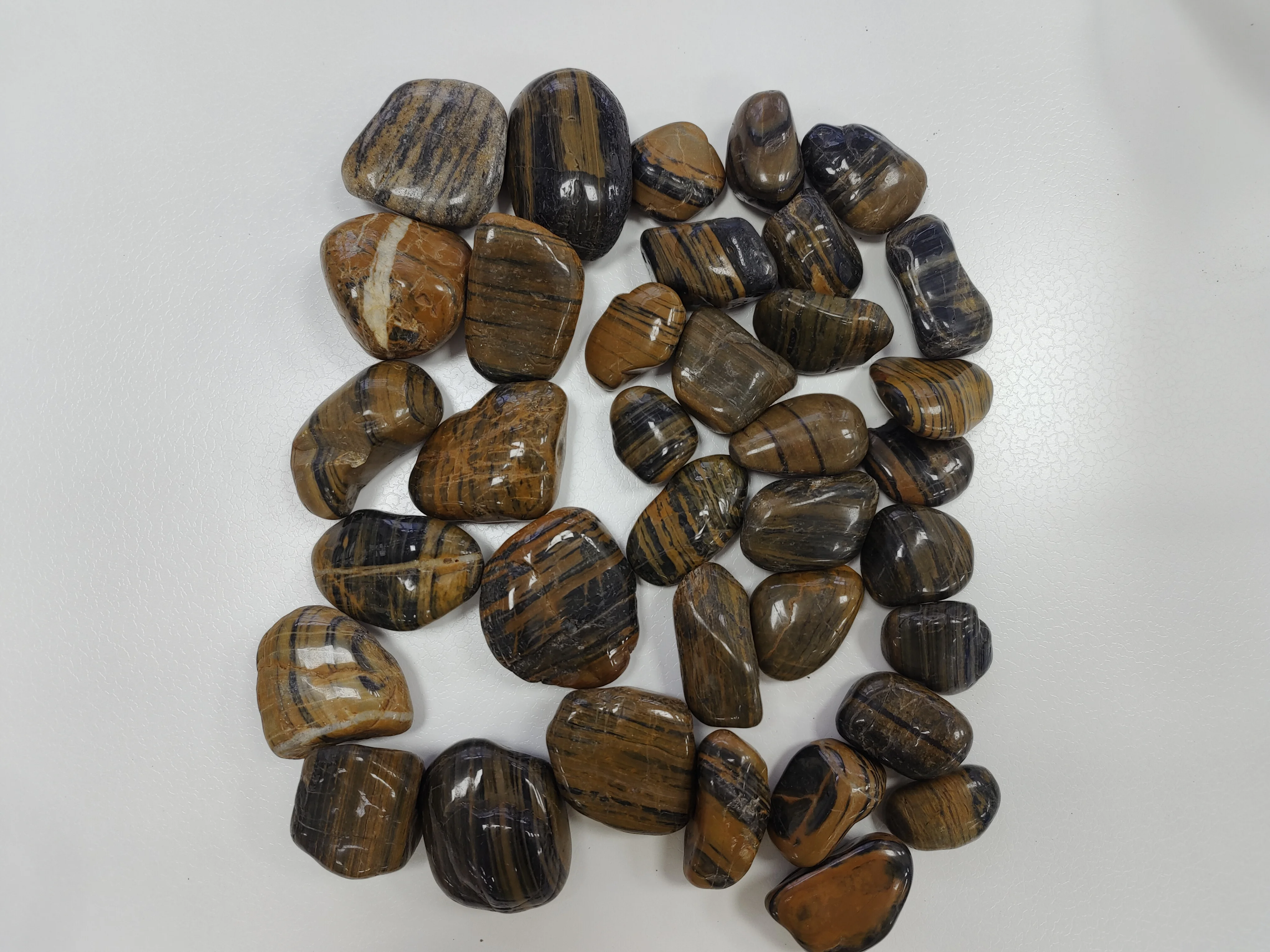 High polished tiger skin yellow pebbles,striped pebbles for paving roads and create scenery