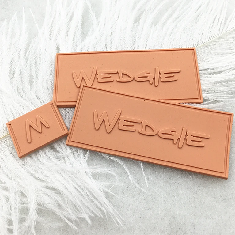 Textured 2D/3D Embossed Garment Rubber Patches High Quality Custom Private Logo Sew On PVC Rubber Labels For Clothing