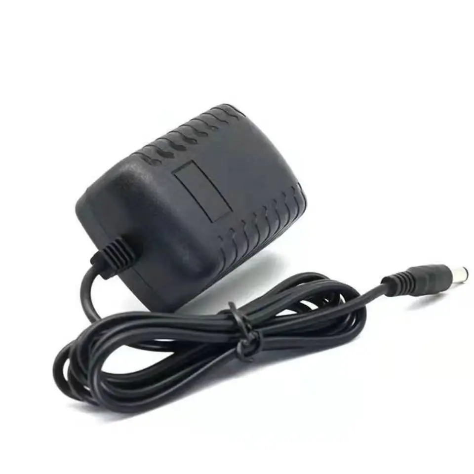 New high-quality universal 12V2A power adapter AC DC European plug switch suitable for monitoring TV mobile hard drive charging