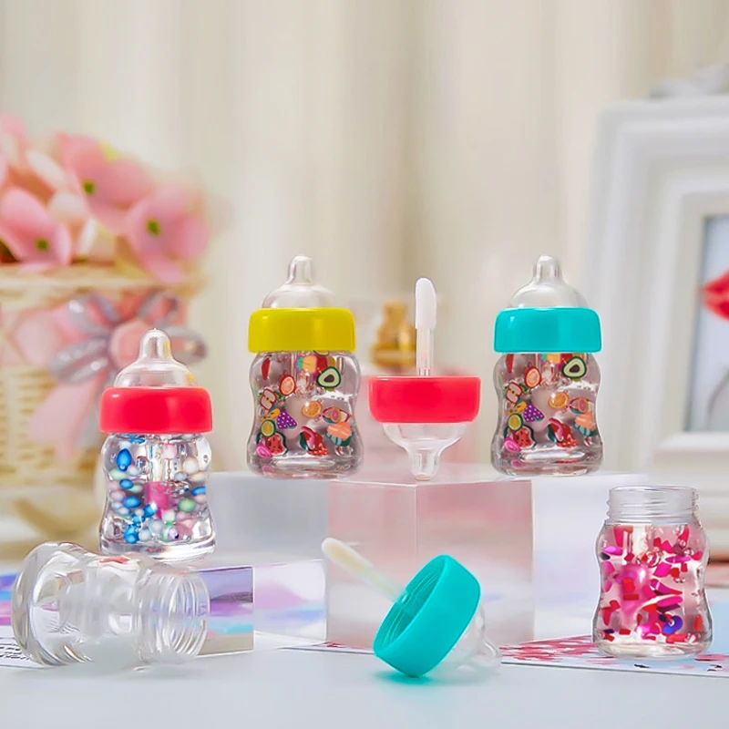 High quality Wholesale Hydrating Kids Cute Baby Bottle Candy Lip Gloss Tubes Lip Oil Plump Private Label Custom Vegan Lip Gloss