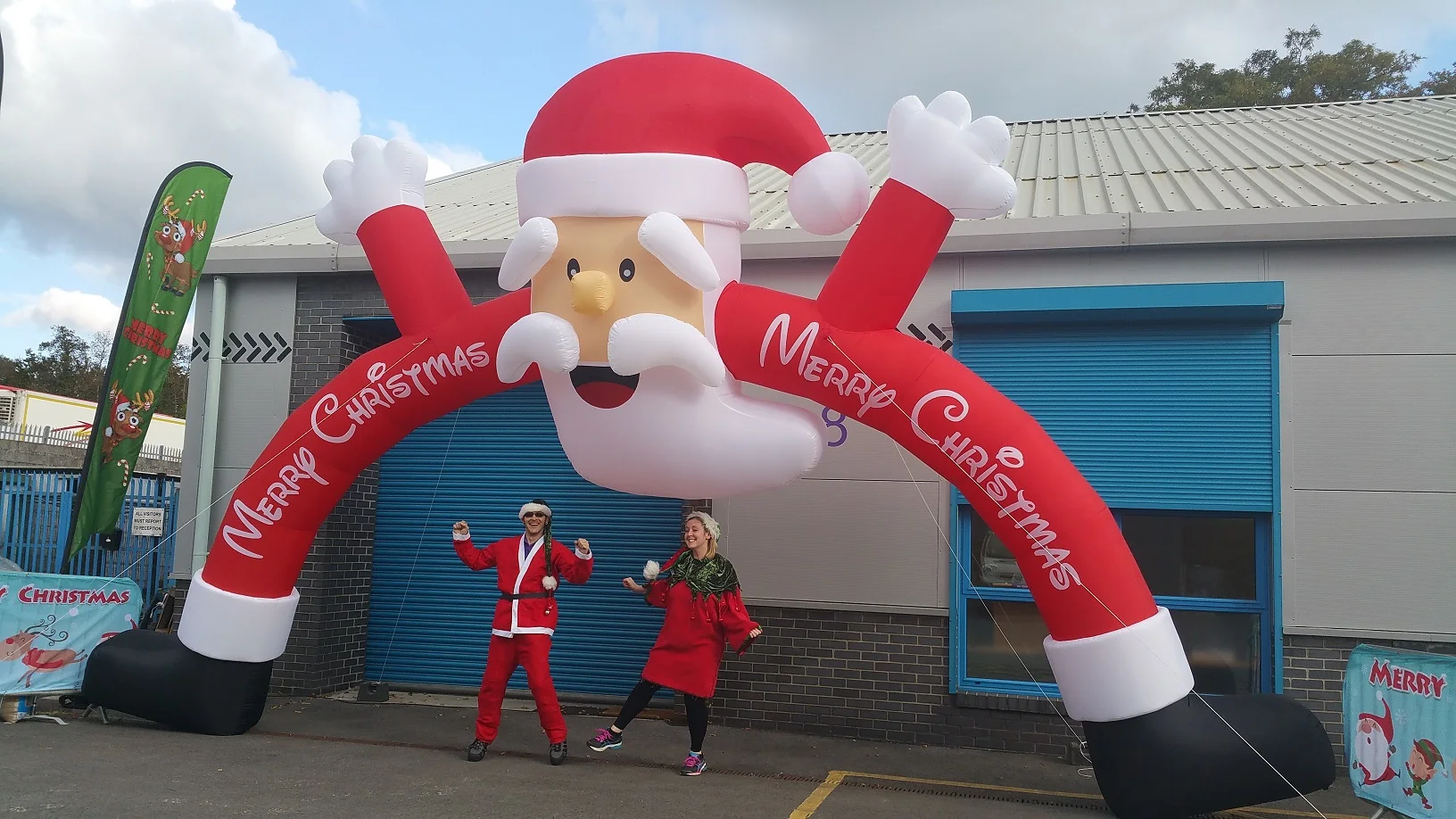 Shenzhen factory wholesale premium outdoor inflatable decorative climbing wall Christmas Santa Claus