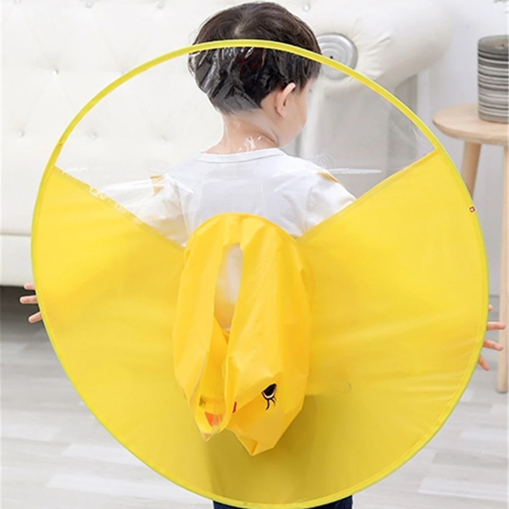 
Kids Cute Ufo Rain Coat Children Creative Umbrella Hat Magical Hands Free Raincoat Cute Duck Rain Gear 