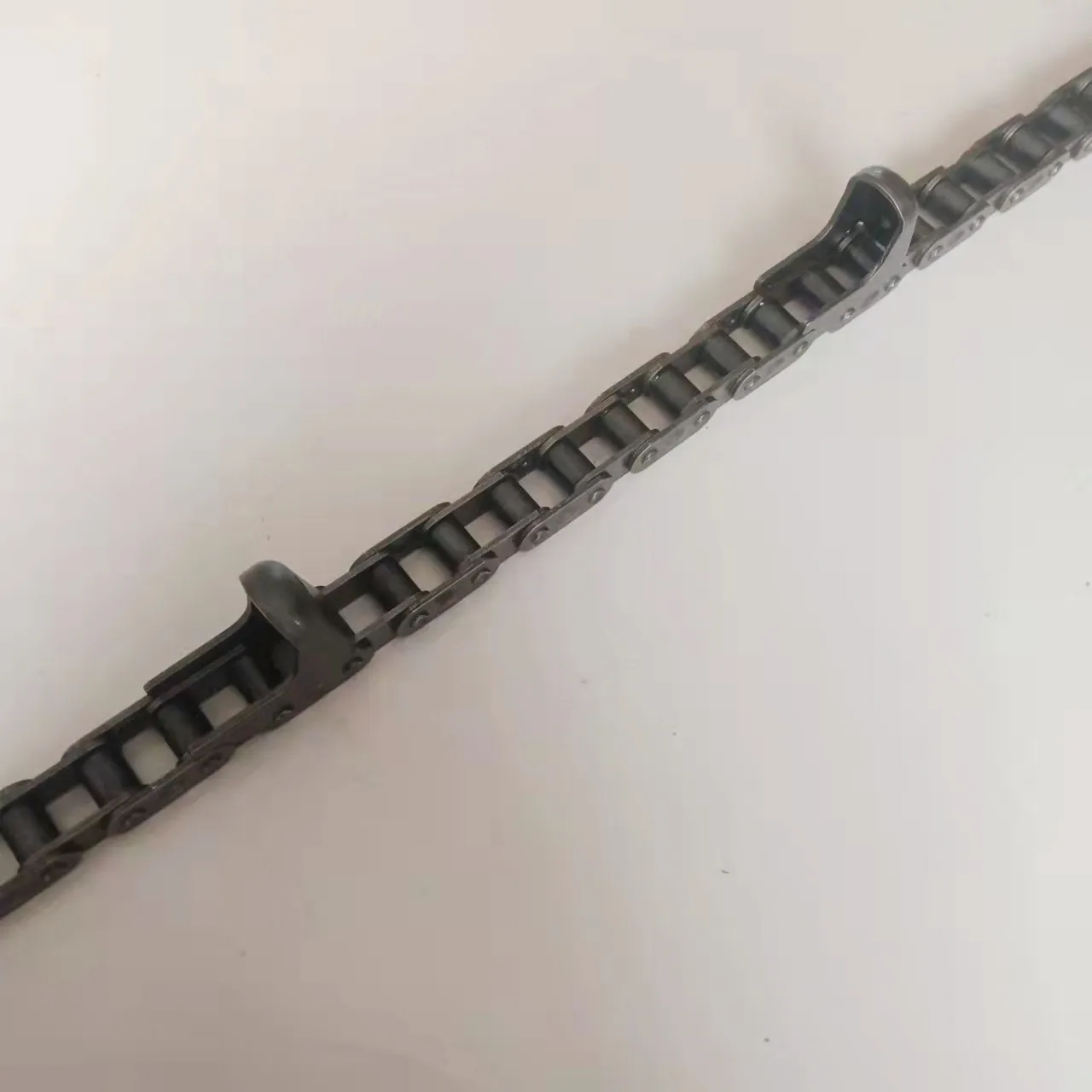 China manufacturer of high quality forged scraper chain for cement conveyor