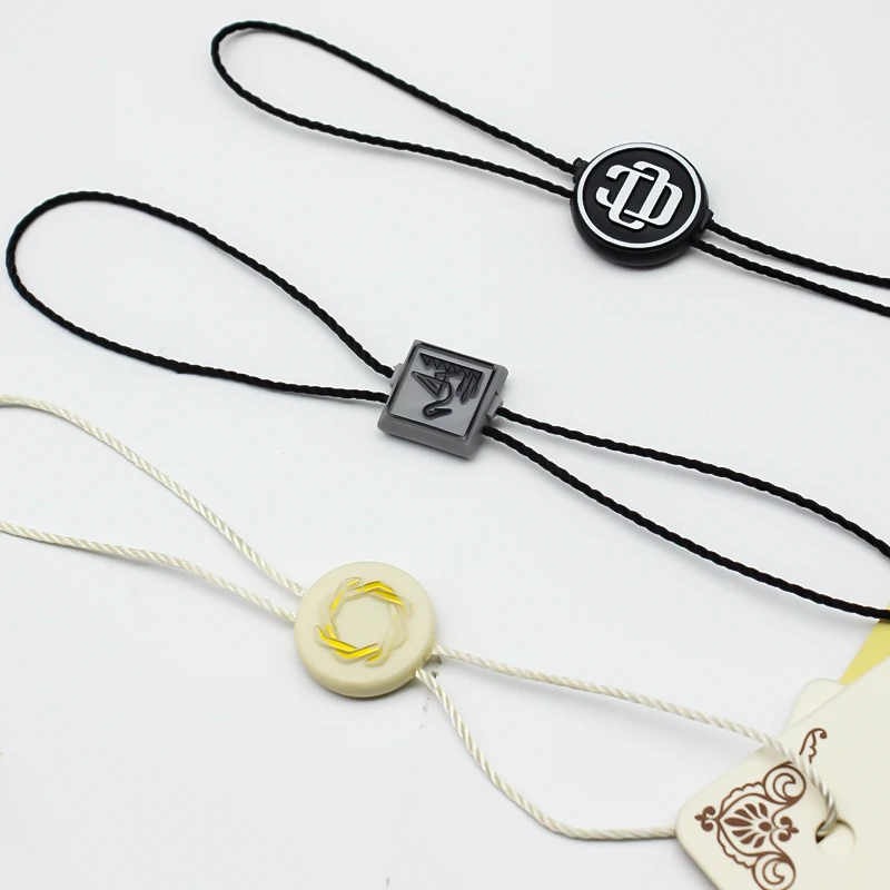 High Quality Custom Clear Embossed Name Logo Labels Plastic Swing Hang Tag Seal String for Luggage and Garment Labels for Shoes