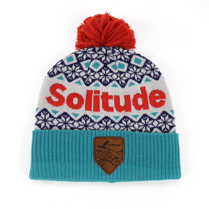 BSCI Factory Supply High Quality 100%Acrylic Pom Pom Beanie Knit Ski Cap Leather Patch Ribbed Cuffed Beanie