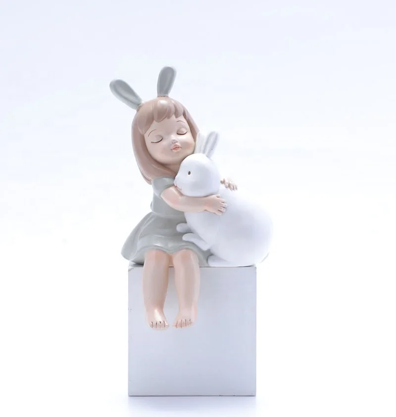 
Lovely resin girl sculpture hug rabit figurine sitting on the edge of desk for girls room Decorative for birthday gifts 