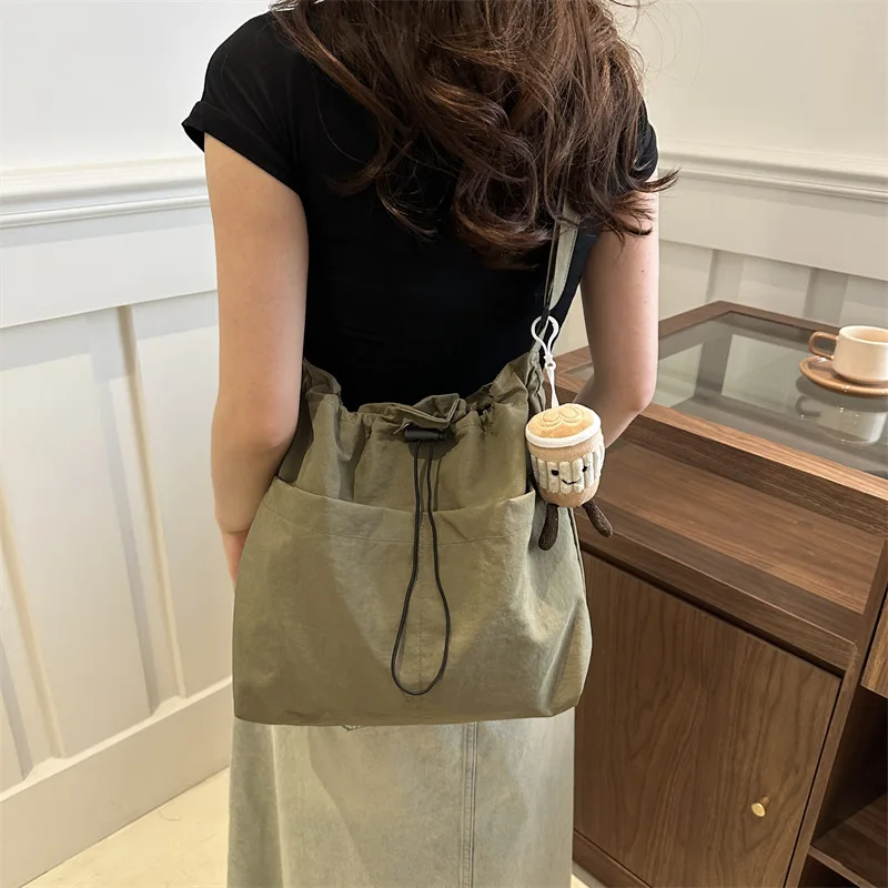 Japanese Style Ins Street Leisure Female Crossbody Shoulder Bag With Drawstring Opening Solid Color Bucket Shape Messenger Bag
