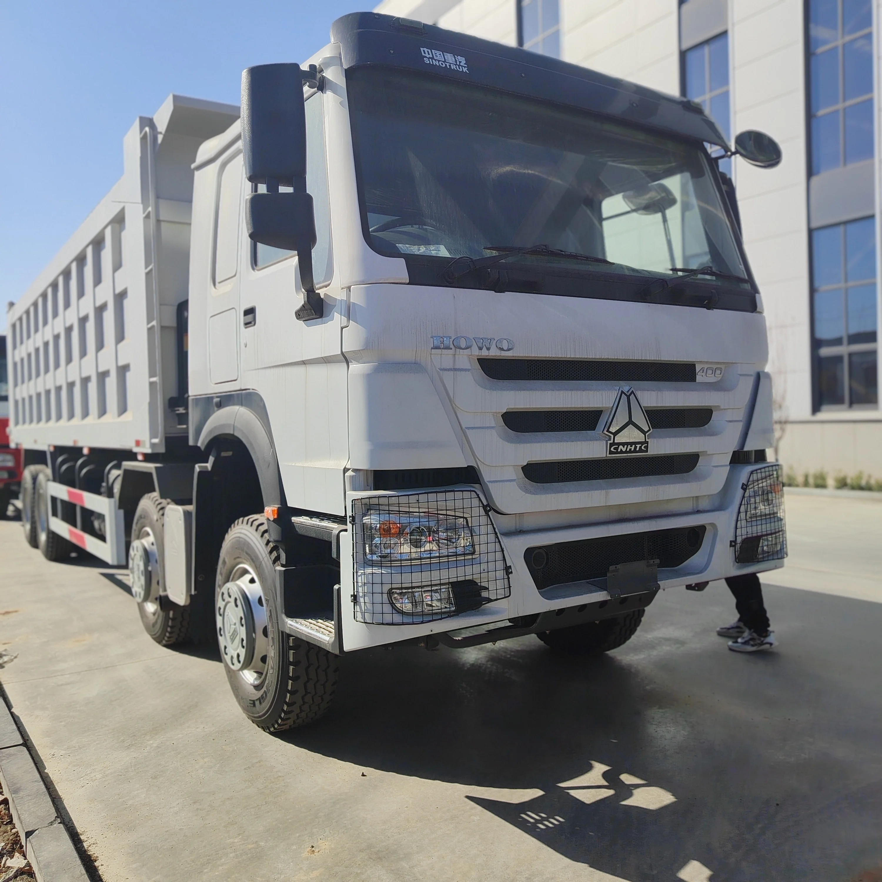 Sinotruk 8x4 howo Heavy Duty Euro3 emission 400hp new Mining tipper dump truck for hot sale