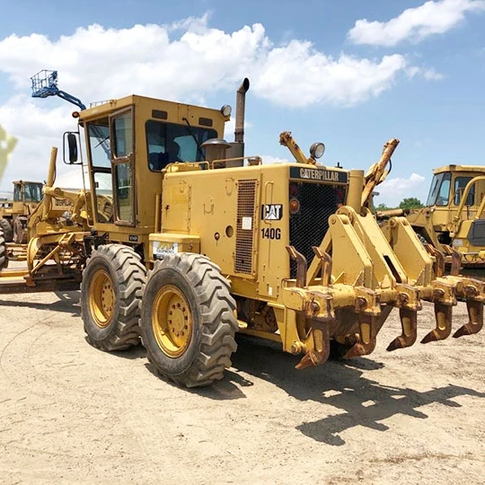 Б/у автогрейдер Caterpillar 140G для продажи в Шанхае, Китай