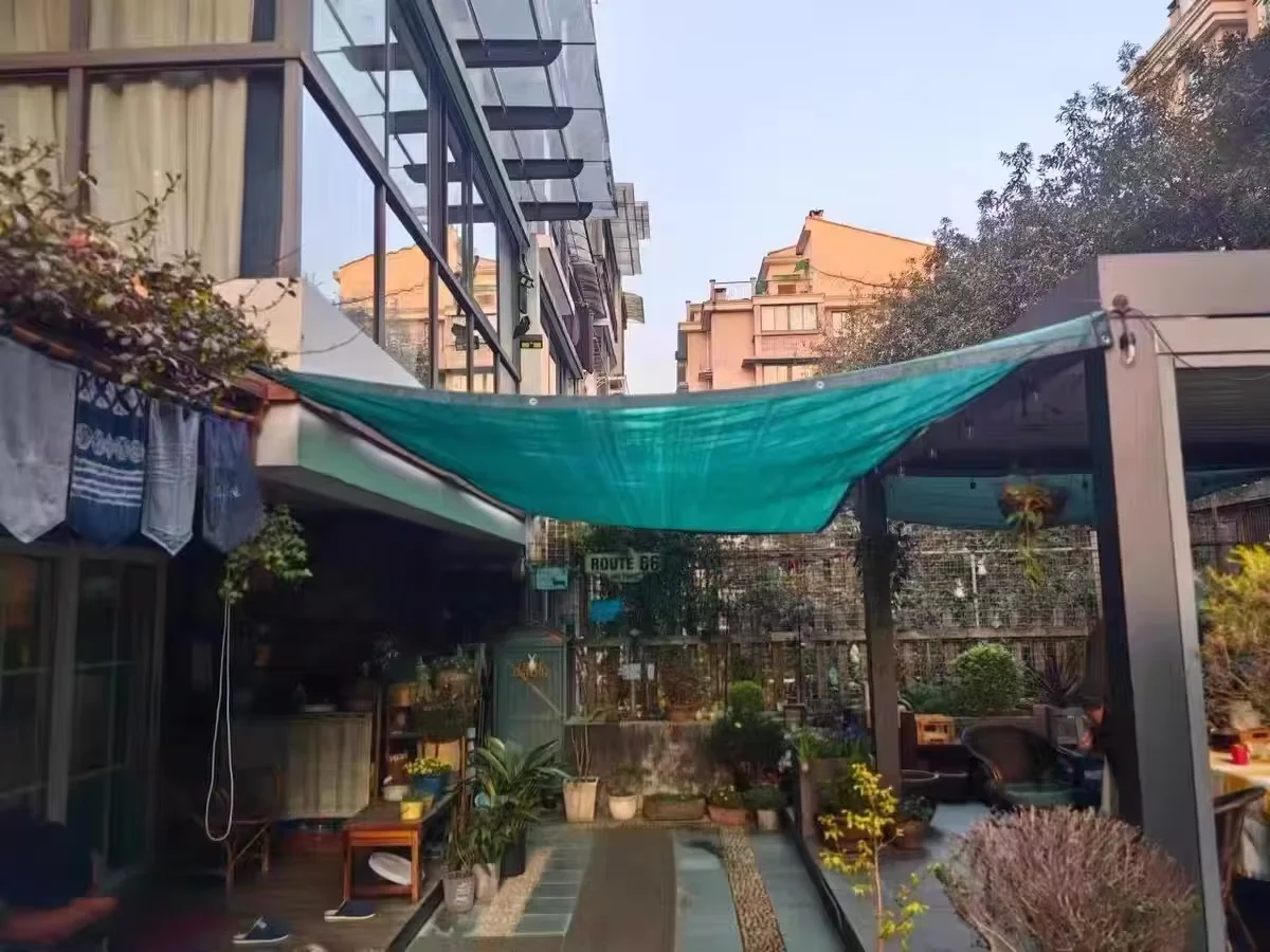 Hot sale 100gsm high density polyethylene outdoor balcony courtyard carport dark green edge sunshade net