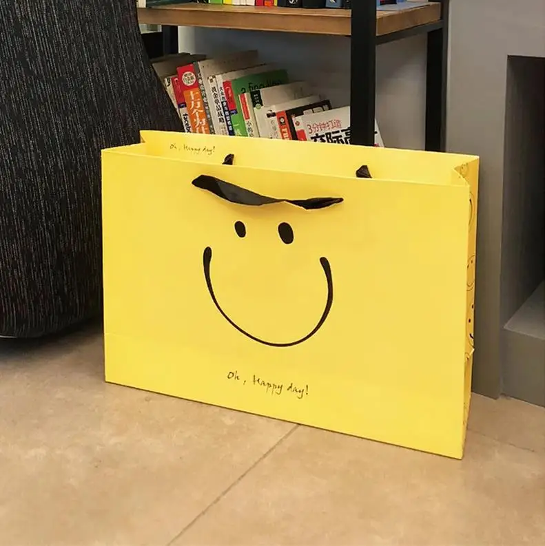 Cute Paper Bags With Your Own Logo Yellow Smiling Face Luxury Shopping Gift Paper Bags For Shoe Clothing Packaging