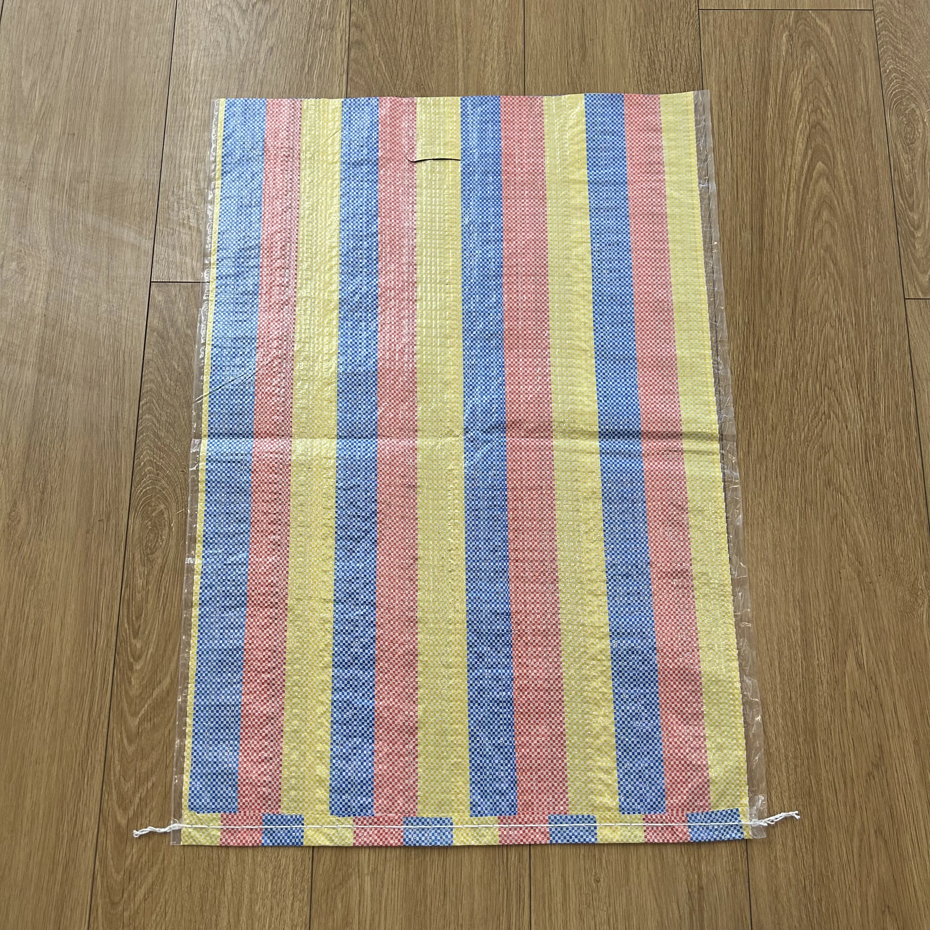 Ghana Multi-color Stripes Laminated PP Woven Shopping Bag Polypropylene Market Sacks With D-cut Handle For Grocery Packaging