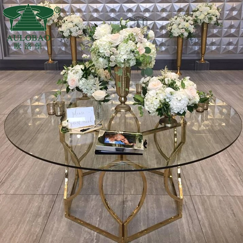 Unique round dining table with rotating centre golden base glass top dining table