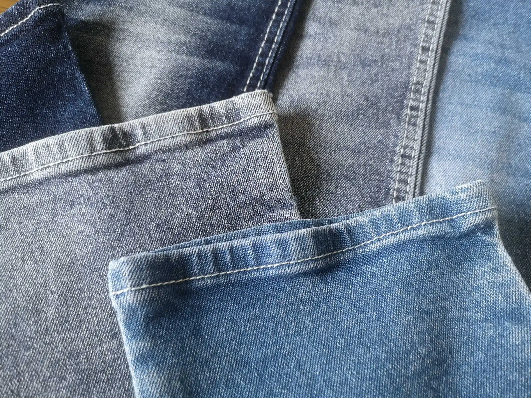 2704 Thick good quality stretch cotton spandex cheap price denim fabric manufacturer for winter jeans