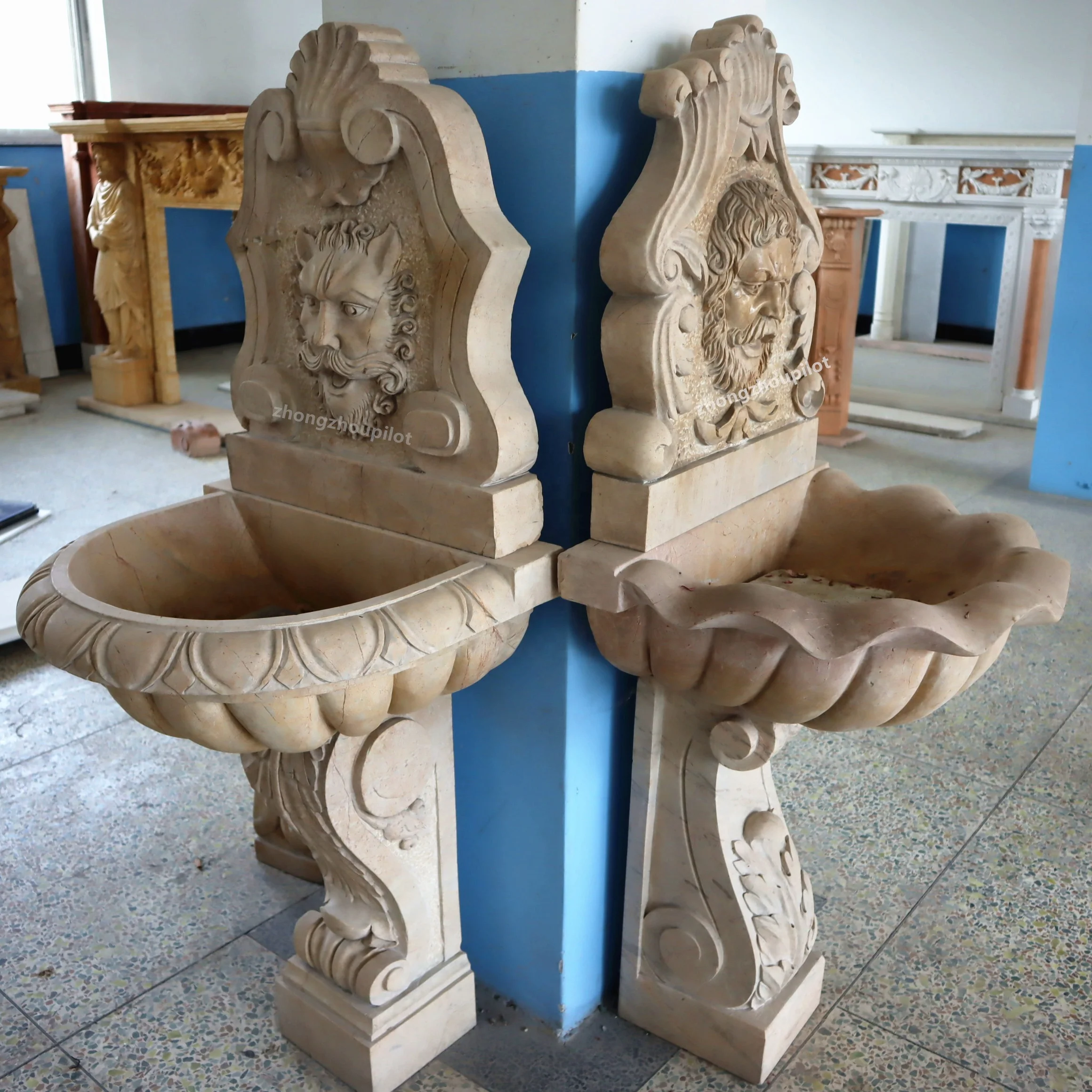 Indoor and outdoor red and beige stone small waterfall wall man head water fountain