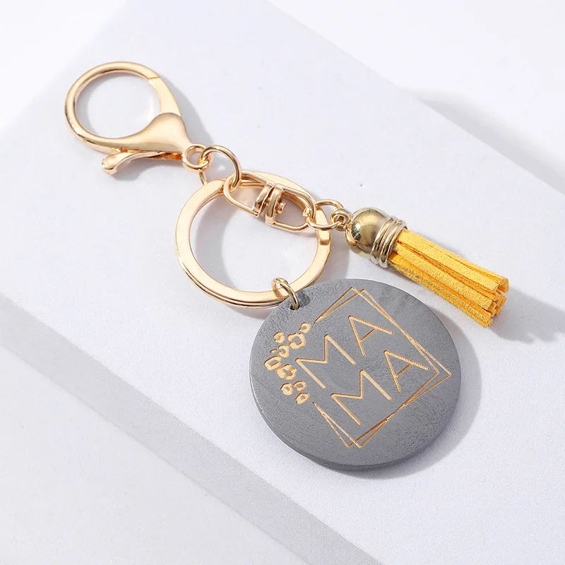 Wholesale Cheap Wood Chain Laser Logo Bag Accessories Custom Design Mother Day Gift Wooden Keychain Pink With Tassel