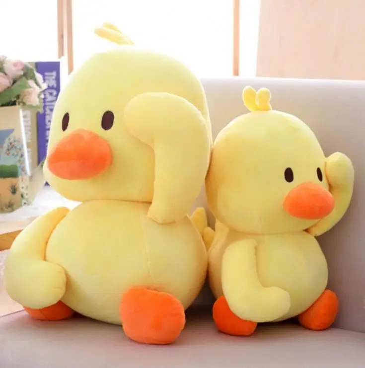 Direct Sale Price Cute plush cartoon fashion yellow duck car pillows super soft duck plush pillow