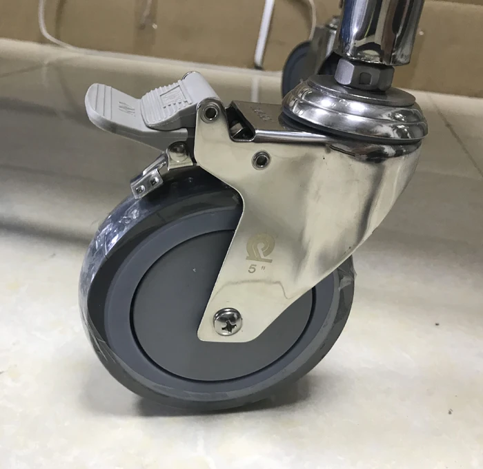 MRI compatible castor with brake for MR room use