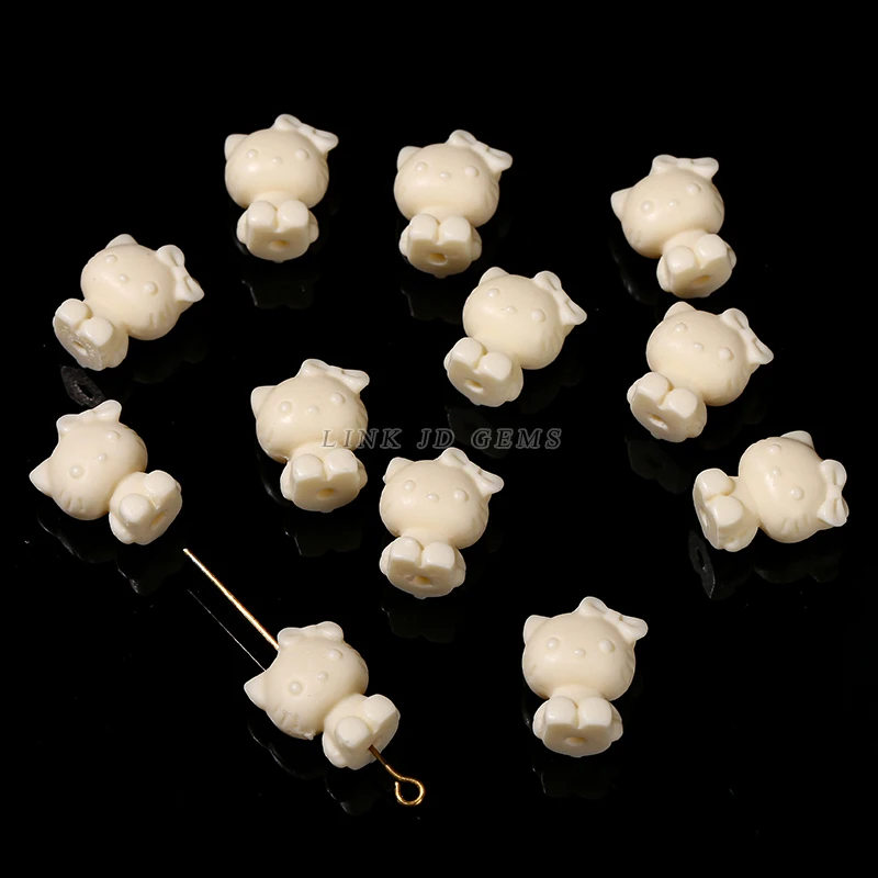 JD Wholesale Handmade Carved Natural Natural Phytelephas Macrocarpa Ivory Nut KT Cat Shape Spacer Beads for Jewelry Making