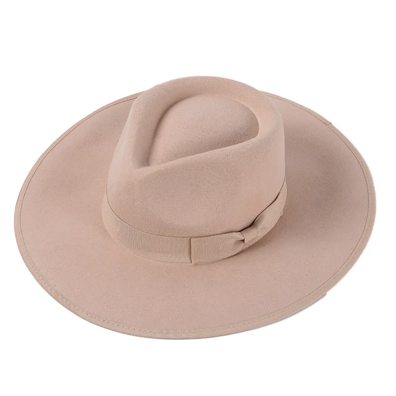 Autumn and winter new edging bow woolen top hat women Europe and the United Kingdom retro leisure wild wool jazz hat