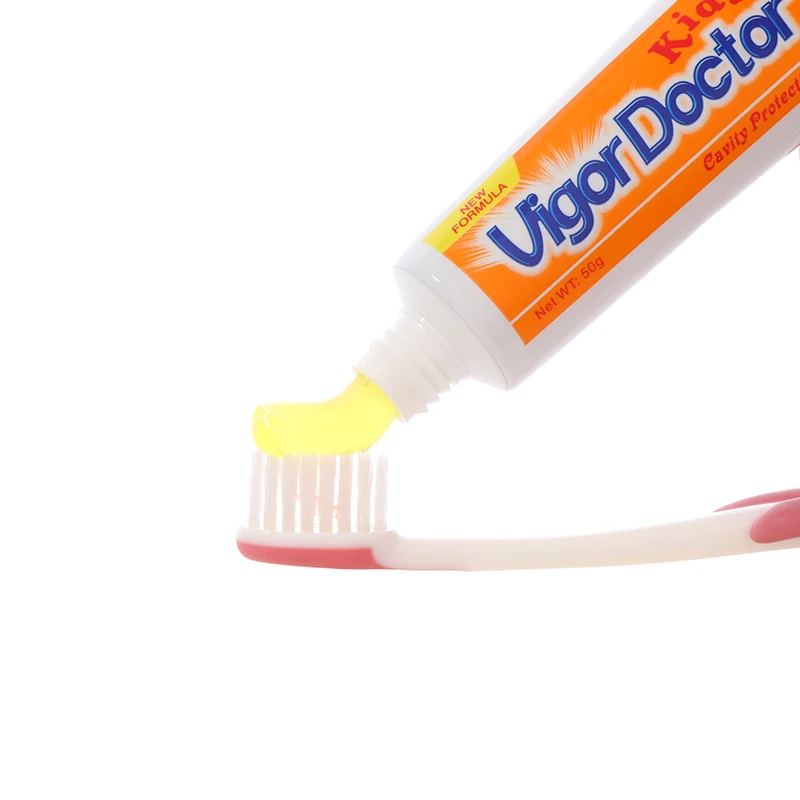 Custom Private Label 50g Orange Fruit flavour food grade fluoridated anti-caries baby/child toothpaste