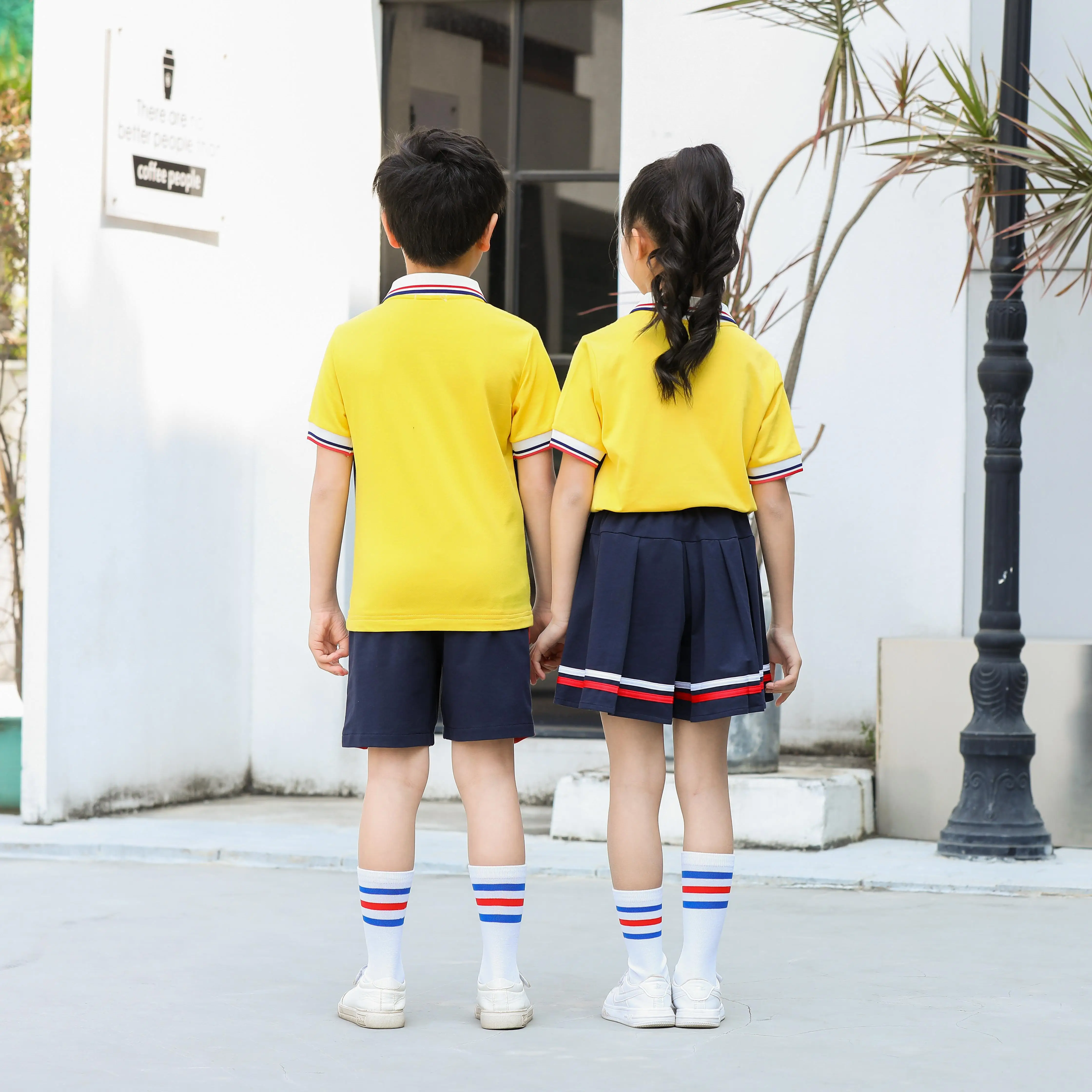 Custom yellow t polo shirt design for girls with school logo kids primary sport uniform manufacturers school uniform design