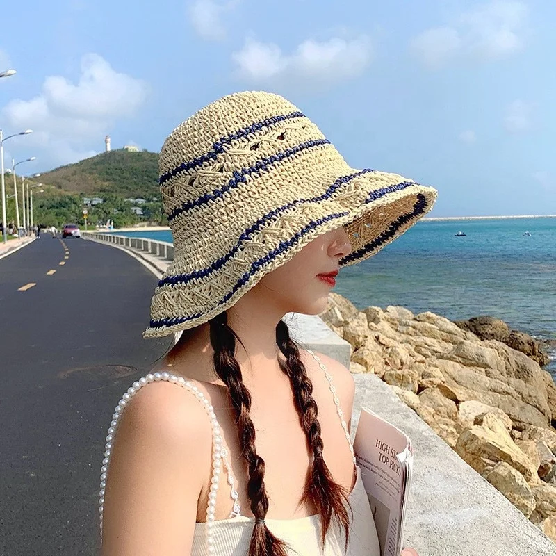 2024 Wholesale Beach Wide Brim Floppy Sun Hat Summer Hollow out Breathable UPF50+ Stripe Hand Woven Packable Straw Hat for Women