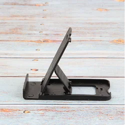 Портативный складной держатель для мобильного