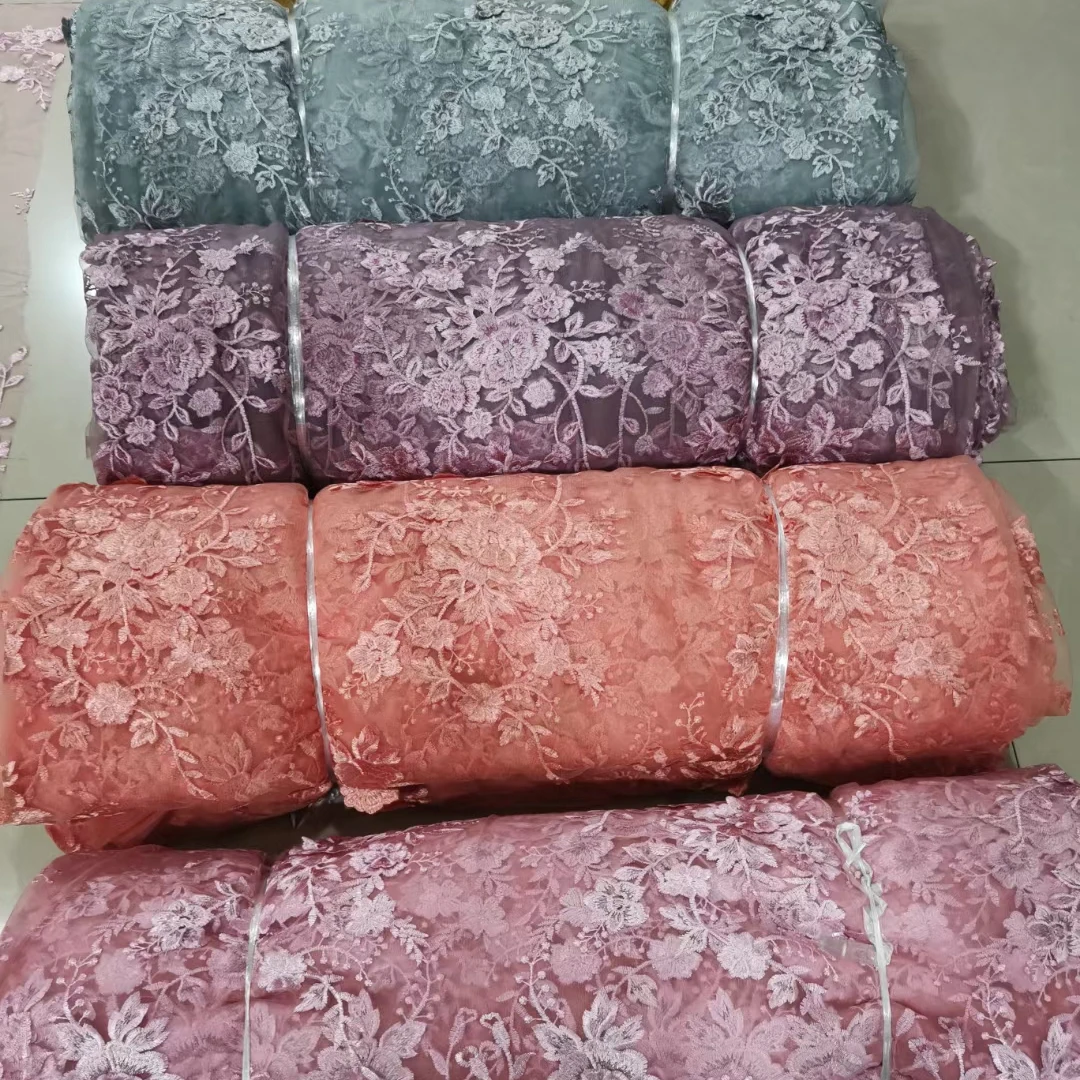 Hot selling big quantity cheap 100% polyester fabric mesh embroidered stock fabric from shaoxing telas de china