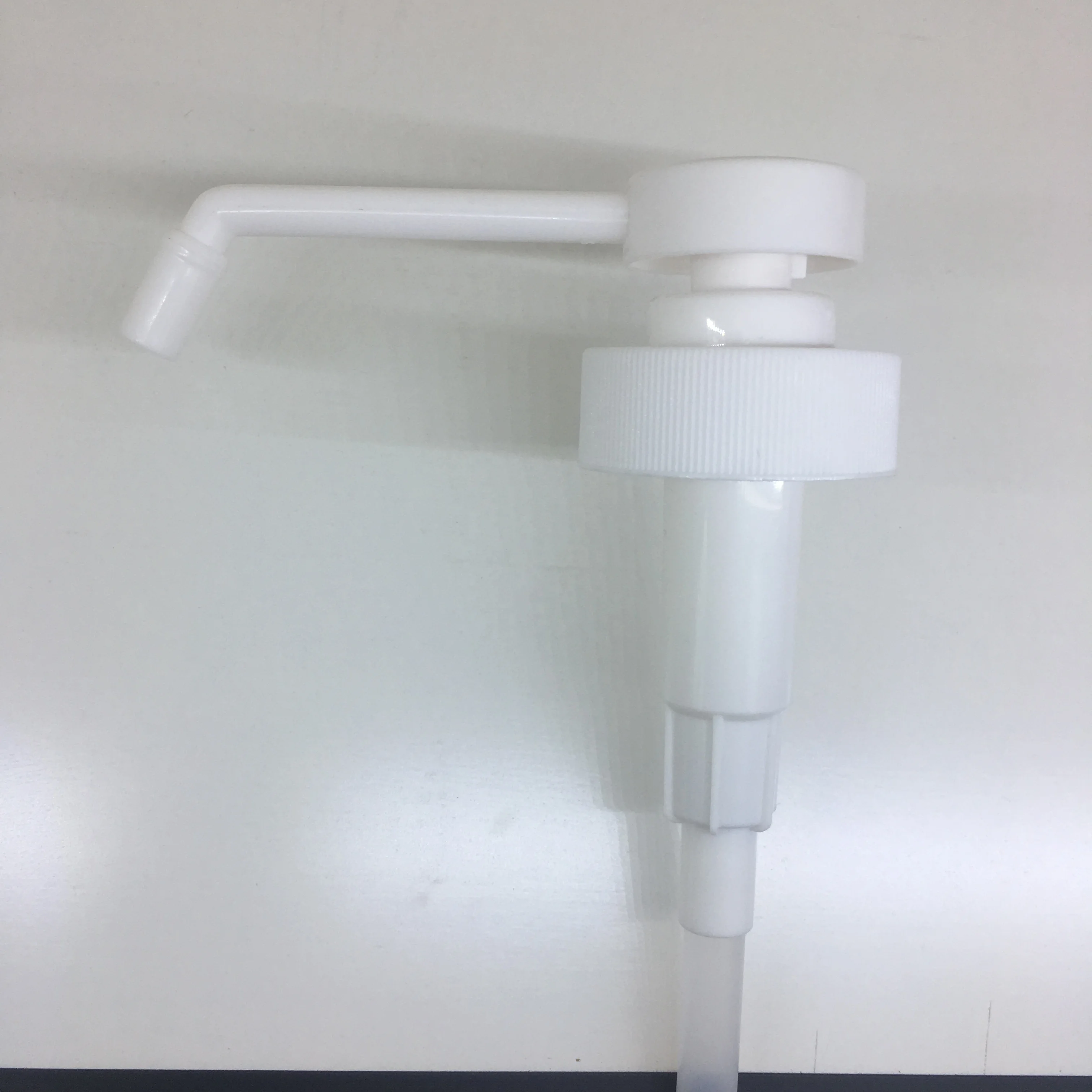 White PP 38-400 sanitizer sprayer dispensing pump with 11 inch dip tube for 1 gallon bottle