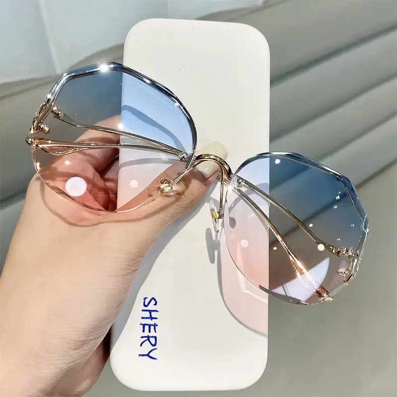 New Personality Round Fade Color Sunglasses for Women Metallic UV400 Cycling Driving Glasses Rimless Luxury Sunglasses 2023