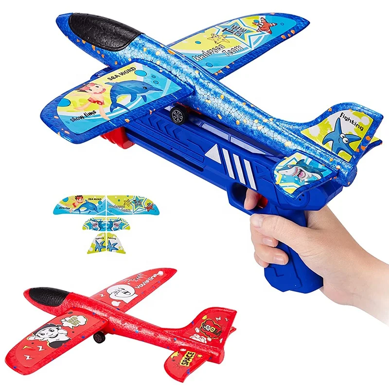 Yicheng 2022 New Year Most Popular Kids Toys Hand Launch Glider Plane Kinderspielzeug Catapult Airplane Foam With Launcher Gun