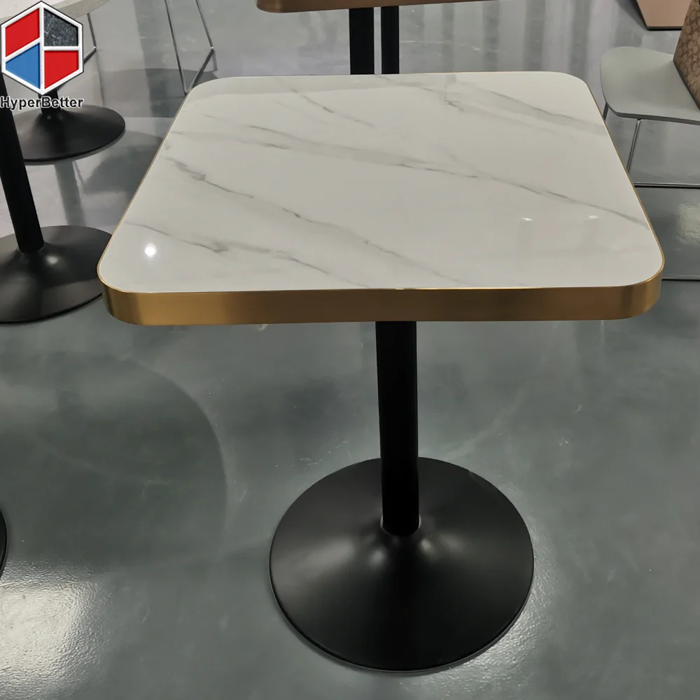 White marble top dinning table with golden ring for restaurant and dining room table