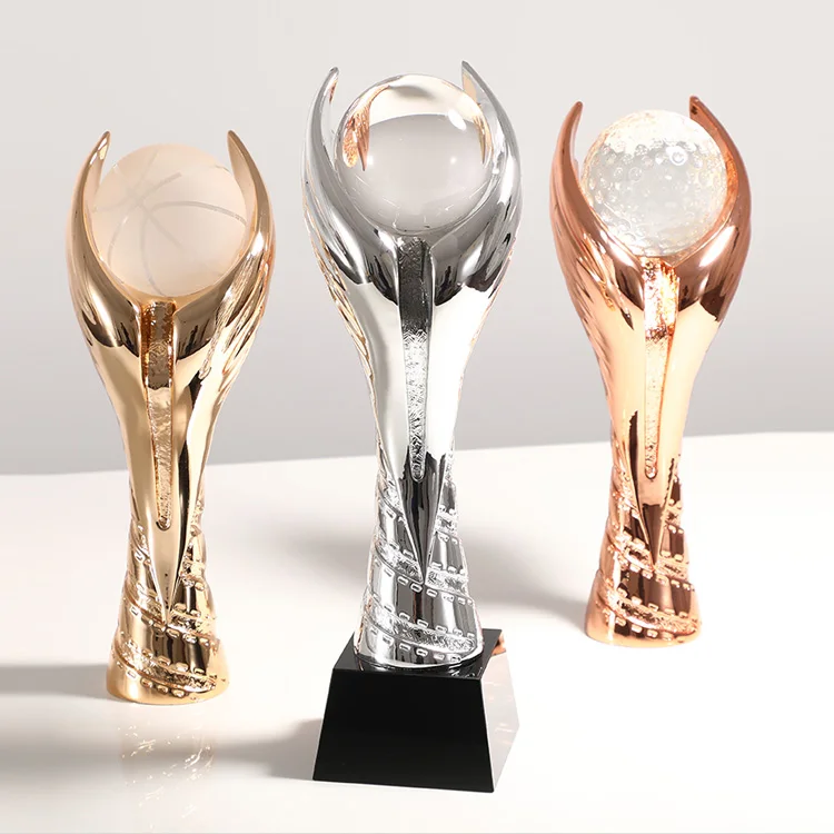 Gold, silver and copper resin trophy customized football and basketball competition group award making flying wings games