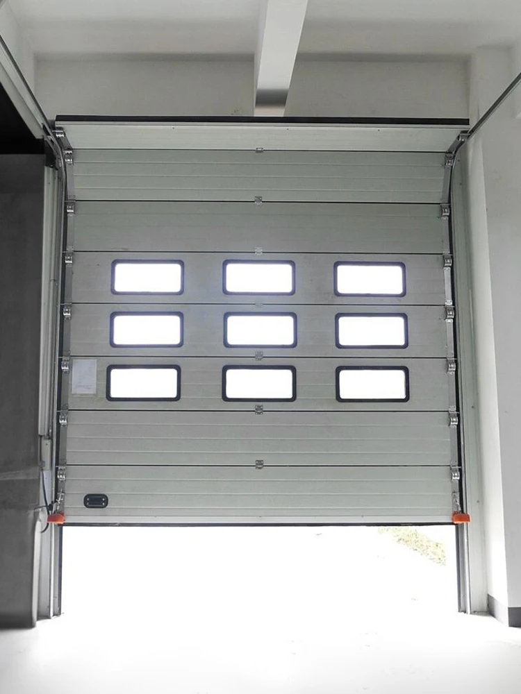 China Industrial Overhead Sectional Vertical Lift Overhead Upgrading Doors Industrial Lifting Door