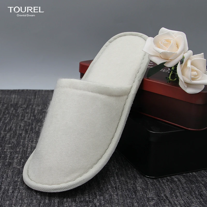 OEM Custom Logo luxury hotel room amenities slippers manufacturer modern design plain nap cloth shoes disposable spa slippers