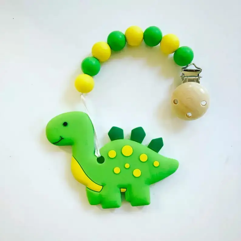 amazon top seller 2019 baby silicone teether dinosaur shape custom bpa free LFGB reports