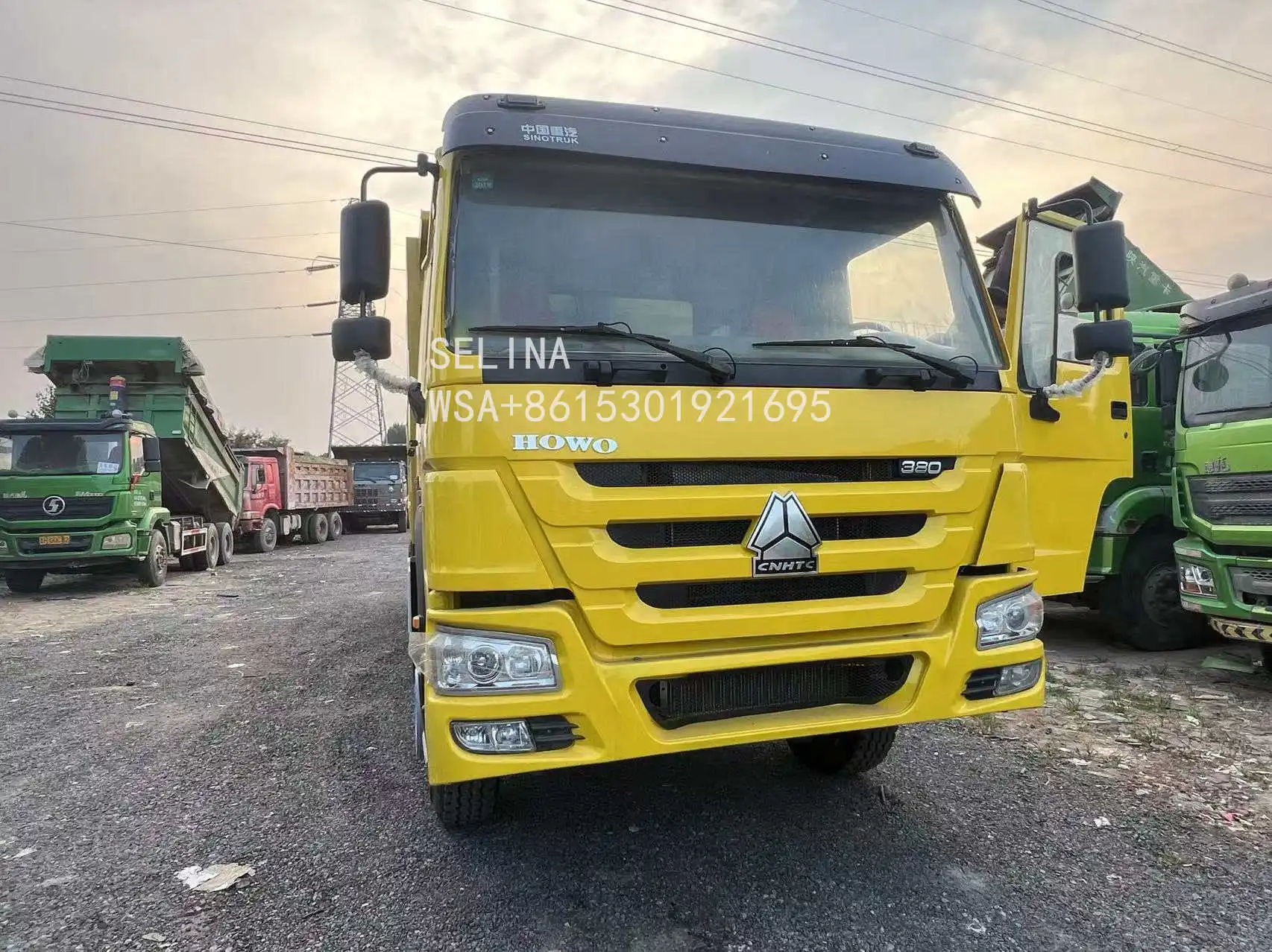 USED HOWO 8X4 DUMP TRUCK WITH EURO 4 EMISSION HYDRAULIC DUMP SYSTEM 380 HP