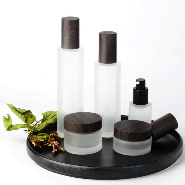 
Empty round glass frosted lotion bottles cream jars cosmetic packaging sets with brown bamboo pattern cover for personal care 
