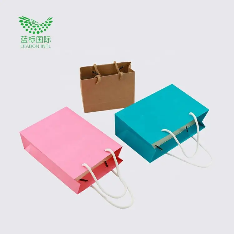 Manufacturers custom large size luxury clothes packaging paper bag with your own logo