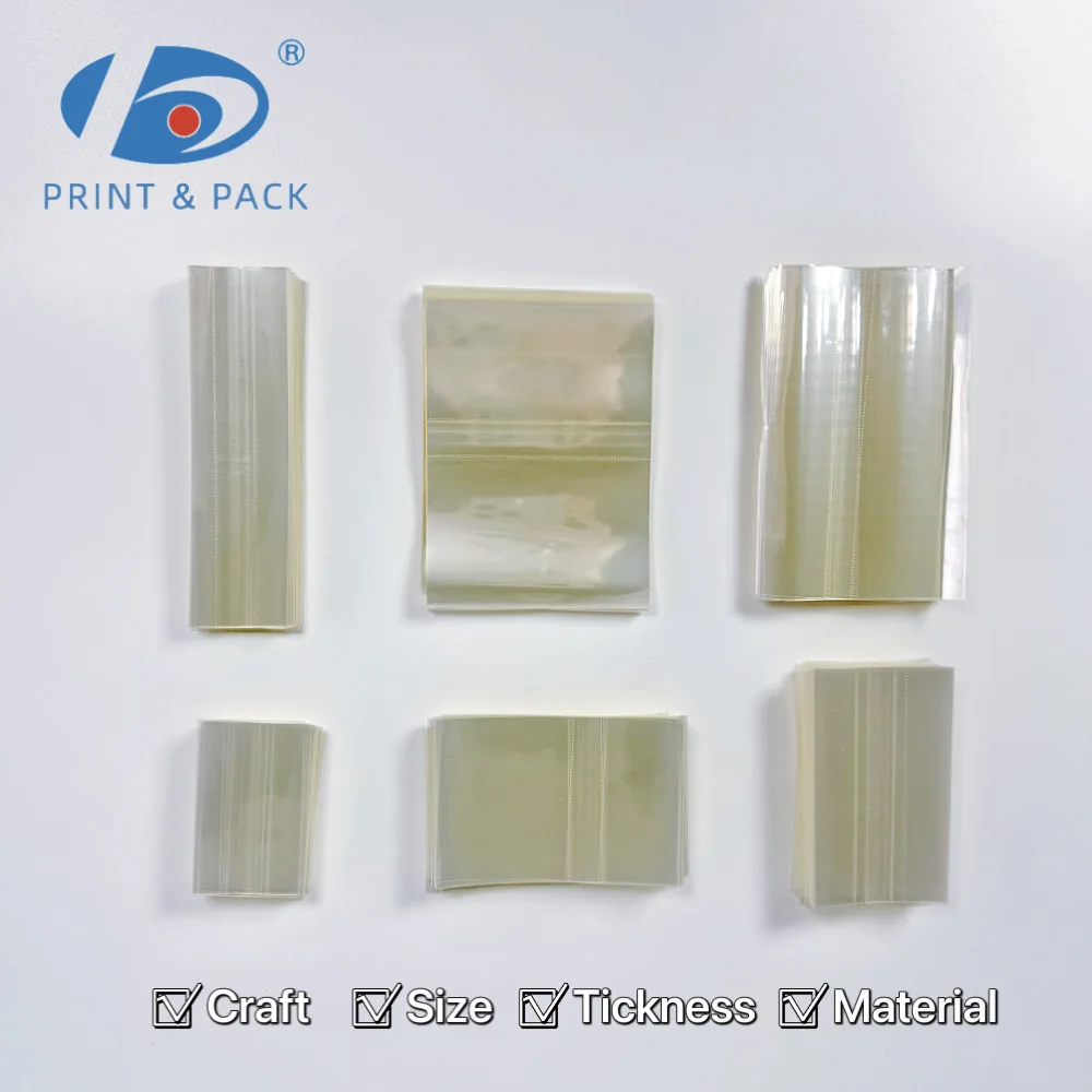 Custom Clear Transparent PVC/PET PlasticHeat Shrink Wrap Film Packaging Shrink Wrap Band for Bottle Neck Sealing