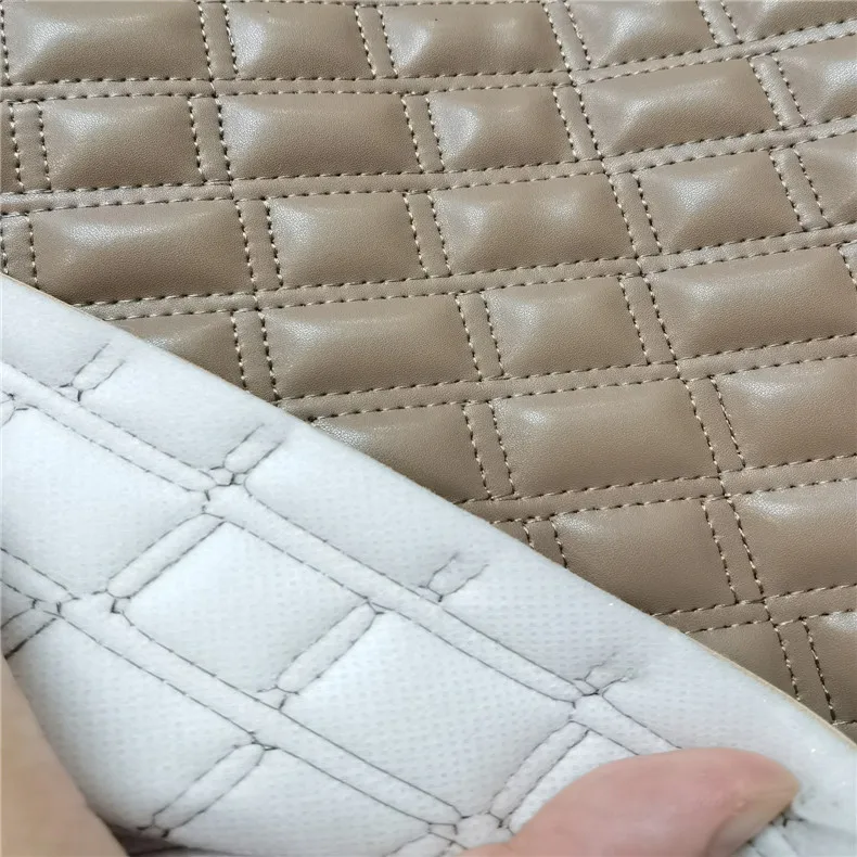 Factory customized embroidered non woven litchi grain artificial leather for car floor mat and car seat cover fabric