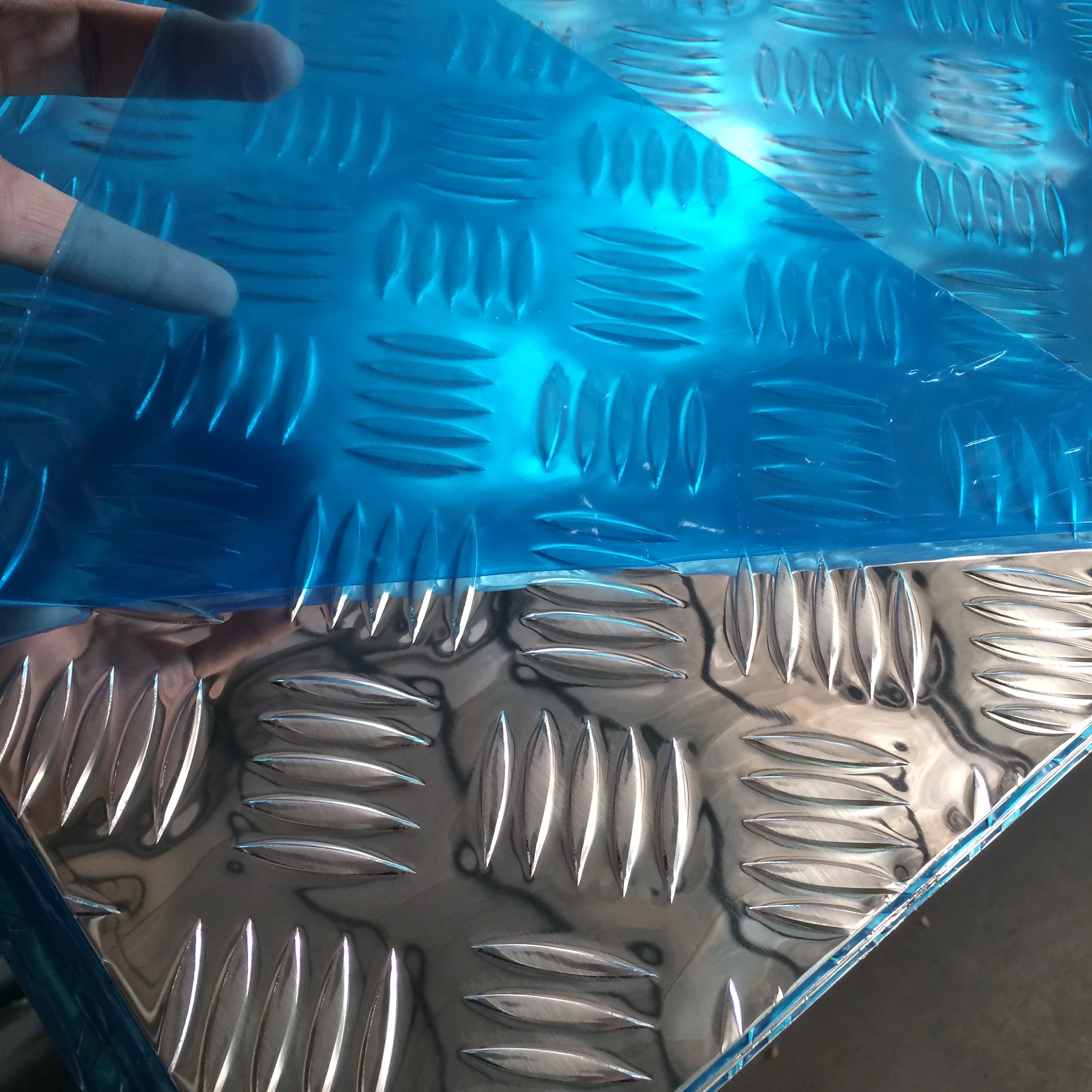 Factory price 1050 1060 1100 3003 aluminum tread plate 1100 1050 3003 aluminum checker plate sheet