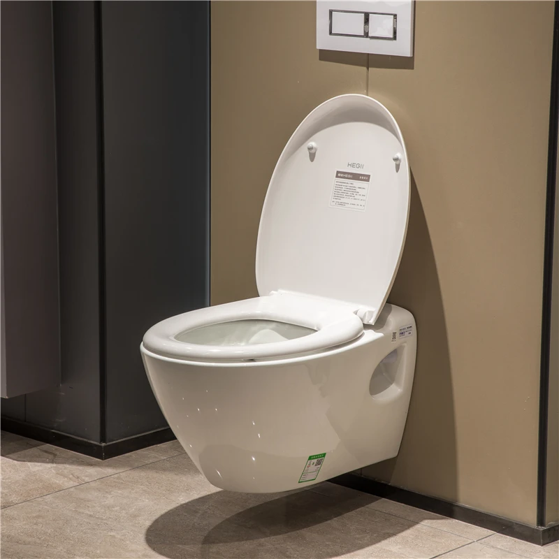 HEGII rimless western hotel sanitary ware concealed tank p trap ceramic hanging wall mounted toilet bowl wall hung toilet set