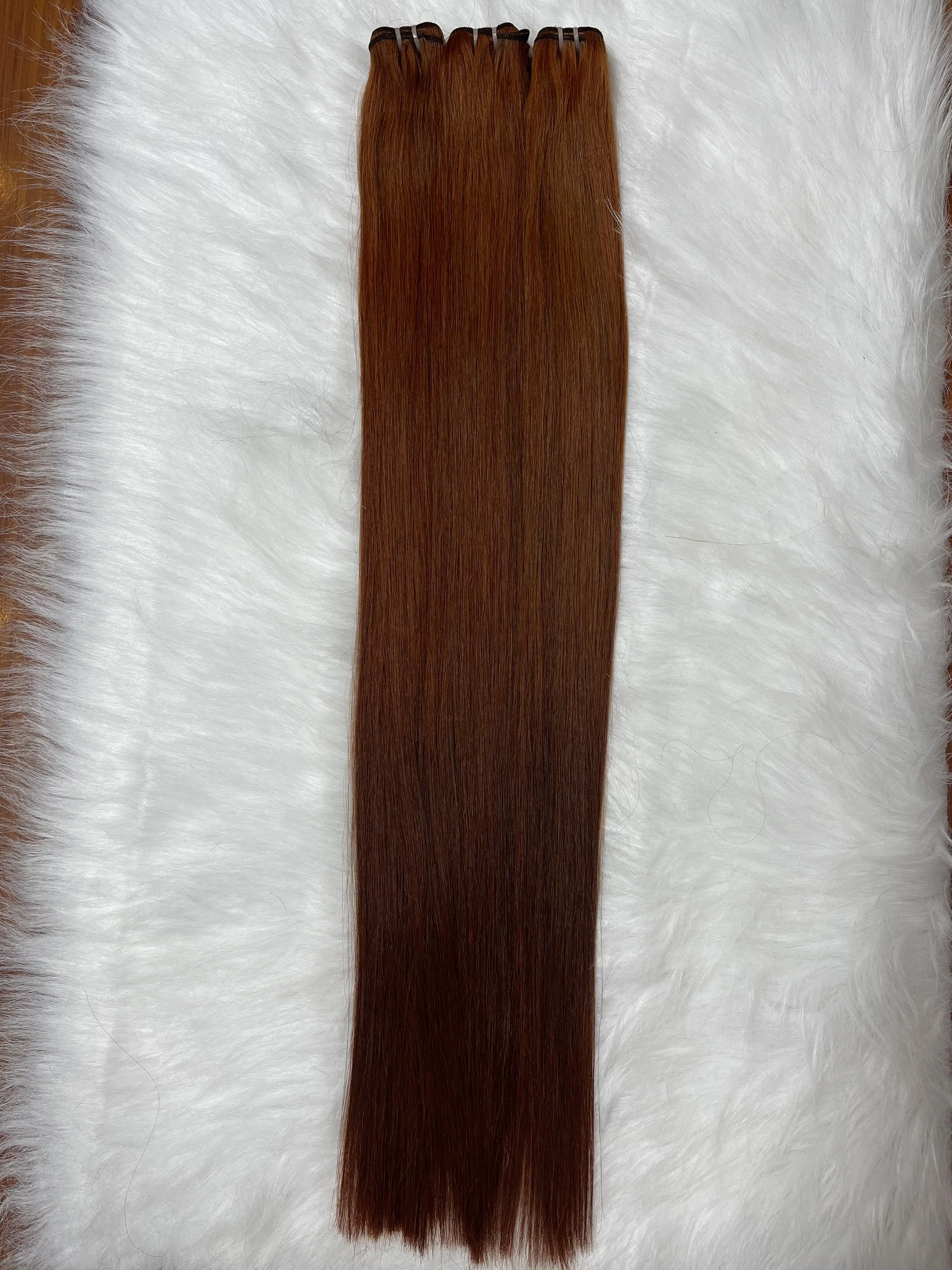 Высококачественные человеческие волосы для наращивания из Вьетнама оранжевого цвета